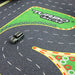 The Lacatang Shop's Turbo Remote Control Drift Car Track offers an exhilarating racing experience with a small toy car navigating its gray surface adorned with white dashed lines and a "Turbo Racing" green section. Colorful circular patterns beautifully border this track for all ages.