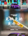 A digital advertisement showcases a miniature purple Turbo1/76 Miniature RC Remote Control Electric Sports Car C71 C72 C73 Simulation Toyota by Lacatang Shop on a toy road. The text, mostly in Chinese, highlights "Turbo Racing" with key phrases emphasizing speed, expertise, and features like upgraded control lines, realistic details, and cool lighting effects.