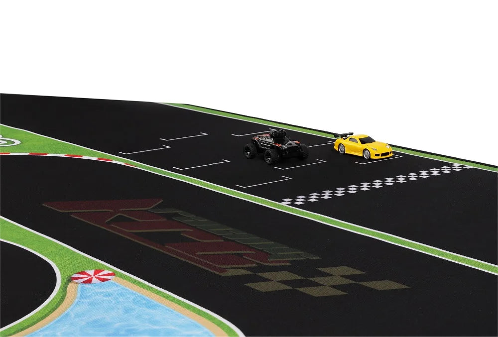 Two mini cars, one black and one yellow, race on the 1600x900mm Portable Turbo Racing Track from Lacatang Shop. This mat has lane markings, a checkered start/finish line, and a pool graphic with a red and white barrier.