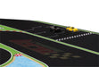 Two toy cars, one black and one yellow, sit on the Portable Turbo Racing 1.6x0.9m Table Mat by Lacatang Shop. This rubber track accessory for 1/76, 1/64, and 1/58 models features lanes, a finish line, colorful border designs with water, and a red-and-white candy stripe pattern.