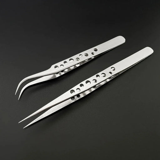 Two metallic precision tweezers from AliExpress, labeled as Industrial Tweezers Electronics Anti-static Curved Straight Tip, rest on a dark surface. One pair features straight, pointed tips, while the other boasts curved, pointed tips. Both pairs are designed with a series of holes along their handles for a lightweight build and enhanced grip. Enjoy free shipping via China Post air mail or ePacket.