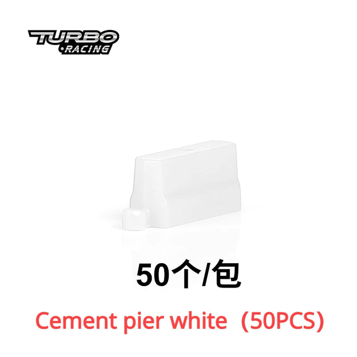 Image of a small white cement pier model from Lacatang Shop, ideal for the TURBO RACING 1:76 Remote Control Car Track Set. "50个/包" in black and "Cement pier white (50PCS)" in red on a white background enhances drift features.