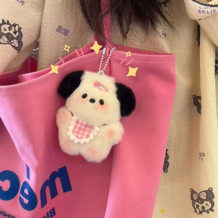 The Lacatang Shop's Adorable Plush Puppy Keychain, featuring a fluffy dog with black ears and a pink checkered bib, is the perfect gift. This cute charm embellishes any pink bag or complements a beige jacket with animal prints for women and girls.