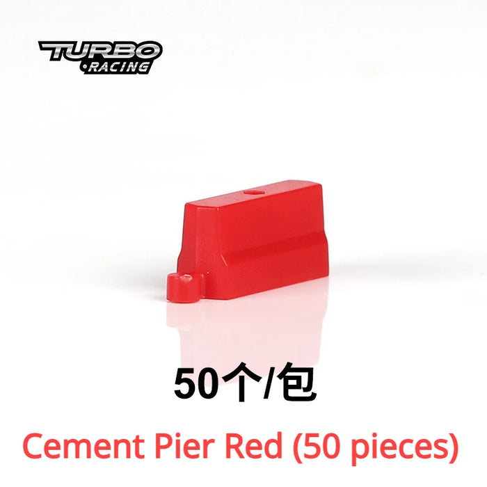 The image features a small red rectangular object labeled "Cement Pier Red" on a white background, perfect for enhancing your track. The "Turbo Racing" logo is at the top left. Includes 50 pieces per package, ideal for your Lacatang Shop 1:76 Remote Control Car Race Track Set with Drift Jump and Cement Obstacles.