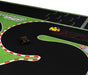 Feel the excitement of Turbo Racing 1:76 with Lacatang Shop's RC car track set. It offers red and white borders, sharp curves, a checkered finish line, and lush green grass. The set includes two remote control cars: one black with orange stripes and another yellow.