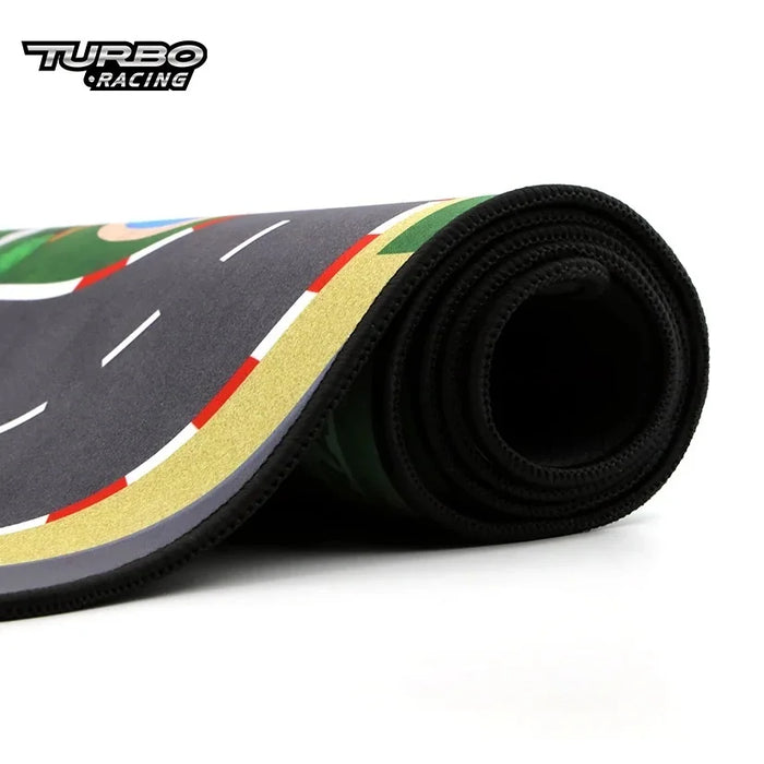 Lacatang Shop presents the Turbo Racing Portable 1600x900mm Table Race Track Mat for Mini RC Cars, featuring a road design with a black edge and "Turbo Racing" logo. Ideal for toy cars and RC cars (1/76, 1/64, 1/58 scale), it's perfect for endless racing excitement.