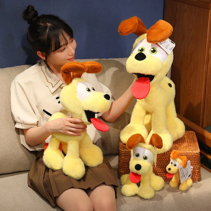 A person sits on the couch surrounded by Lacatang Shop's Kawaii Oudi Dog Plushies, each with large eyes and floppy brown ears. Holding one while others sit around, including in a wicker basket, the cozy setting is ideal for anime lovers who adore cute and quirky designs.