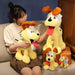 A person relaxes on a sofa with plush toys, including four Kawaii Oudi Dog plushies of varying sizes from Lacatang Shop. With floppy brown ears, big eyes, and red tongues, these cartoon-like companions create a delightful atmosphere ideal for room décor or Xmas gifts for kids and girls.