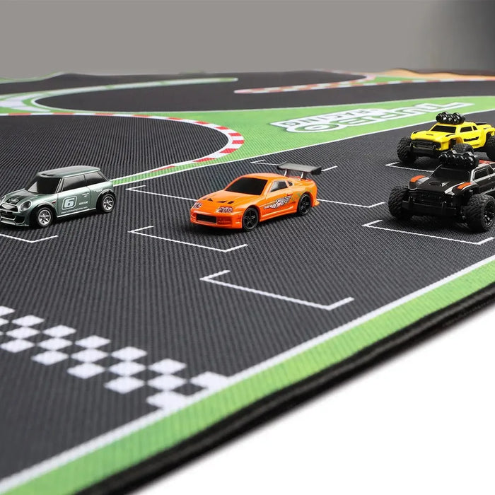 Toy race cars, like the green Mini Cooper and orange sports car, speed across the Lacatang Shop's 160x90cm Turbo Racing Track Mat. Its high-grip surface ensures thrilling turns on a black mat with white lines and checkered patterns, creating an ultimate portable track for 1:76 RC mini cars.