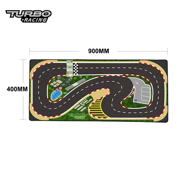 The Lacatang Shop Turbo Racing Rubber Mat, available in 160x90cm and 180x80cm sizes, features a rectangular RC mini car track with winding roads, a checkered finish line, parking area, greenery, and a small pool for a realistic racing experience.