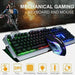 Image of a Ninja Dragon Metallic Silver Mechanical Gaming Keyboard and Mouse Set with Seven Color Breathing Light RGB lighting. The keyboard and mouse from Yellow Pandora are displayed prominently with colorful backlighting. The text reads "MECHANICAL GAMING KEYBOARD AND MOUSE" and highlights features like DPI settings, waterproof membrane, and more.