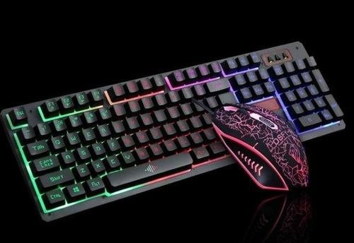 The Ninja Dragons Z4 104 Keys LED Flame Gaming Keyboard with 2000 DPI by Yellow Pandora is showcased. This gaming keyboard boasts a full layout with a variety of colorful LED backlight patterns, while the mouse features an eye-catching patterned design and illuminated accents, all set on a sleek black background.